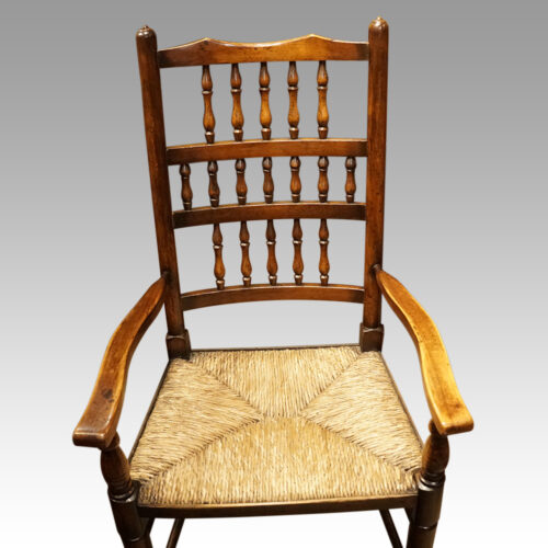 Set of 10 Lancashire spindle back chairs arm detail