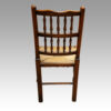 Set of 10 Lancashire spindle back chairs rear