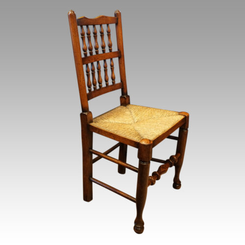 Set of 10 Lancashire spindle back chairs side chair angle