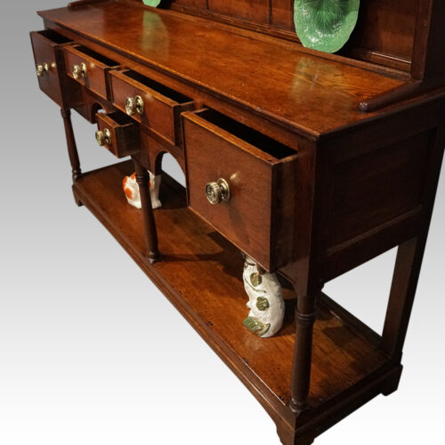 Antique oak Carnarvon dresser drawers open