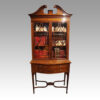 Edwardian inlaid mahogany bookcase on stand