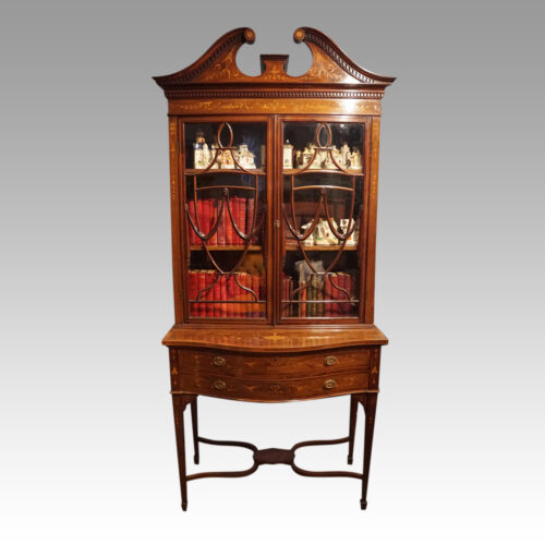 Edwardian inlaid mahogany bookcase on stand