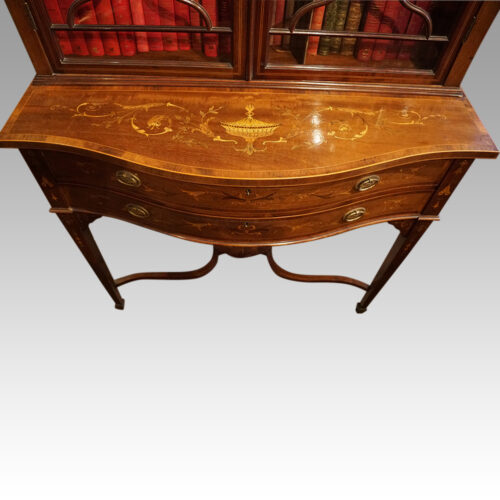 Edwardian inlaid mahogany bookcase on stand bed