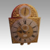 George II walnut longcase clock by Bentley London face