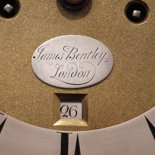 George II walnut longcase clock by Bentley London name plate