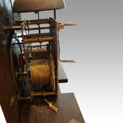 George II walnut longcase clock by Bentley London side movement