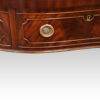 George VI serpentine side table drawer front