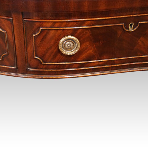 George VI serpentine side table drawer front