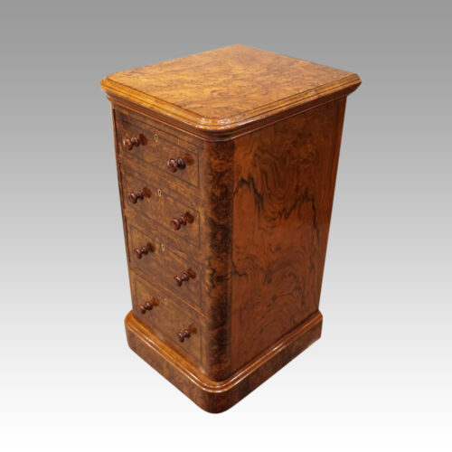 Pair of burr walnut bedside chests at angle
