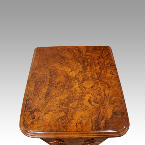 Pair of burr walnut bedside chests top