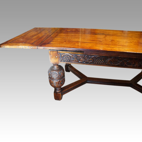 Victorian oak draw leaf dining table side