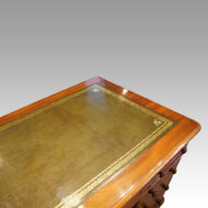 Victorian walnut pedestal desk at angle top