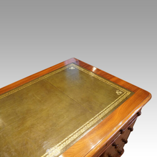 Victorian walnut pedestal desk at angle top