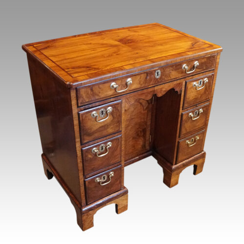 19thc. walnut kneehole at angle