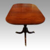Mahogany twin pillar dining table end view