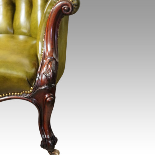 Victorian button back leather easy chair front leg