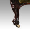 Victorian button back leather easy chair leg detail