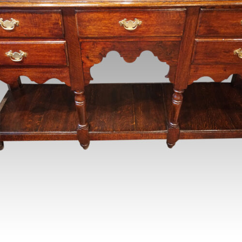 Antique oak dresser base with pot board shaped apron