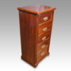 Edwardian walnut Wellington chest angle