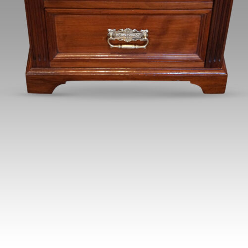 Edwardian walnut Wellington chest feet