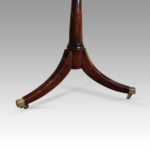George V mahogany triple pillar dining table castors