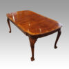 Queen Anne style walnut extending dining table