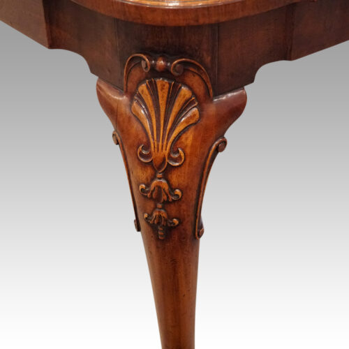 Queen Anne style walnut extending dining table detail