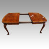 Queen Anne style walnut extending dining table open