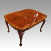 Queen Anne style walnut extending dining table without leaf