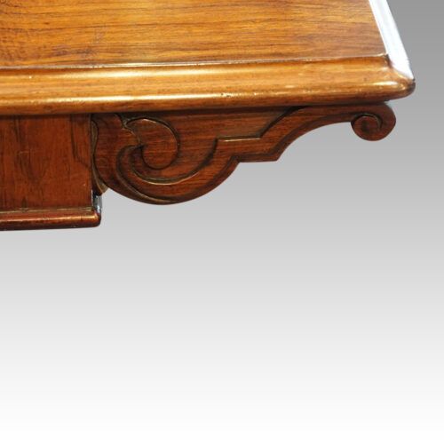 Victorian rosewood library table carved support