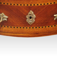 Pair of French bedside cabinets escutcheon