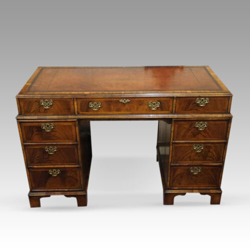 Walnut Georgian style pedestal desk