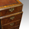 Walnut Georgian style pedestal desk top corner