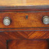William IV mahogany chiffonier drawer front