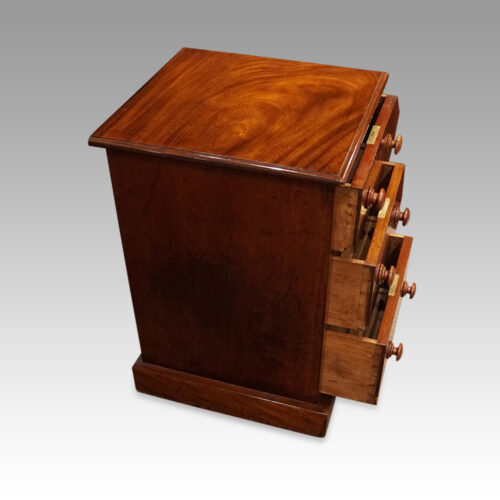 Pair of Victorian mahogany bedside chests drawers open