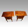 Pair of walnut bedside cabinets top flaps