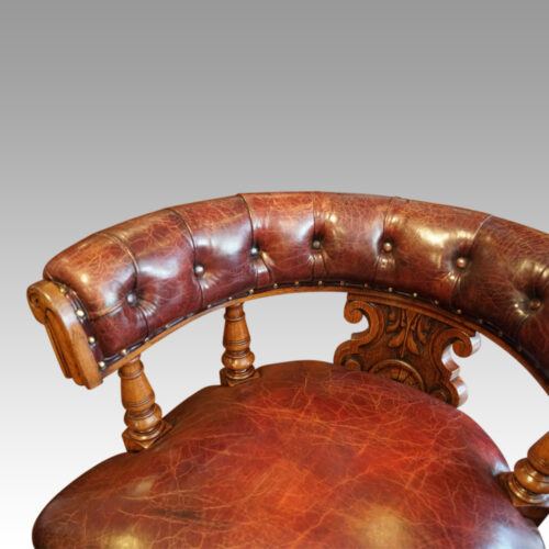 Victorian oak revolving desk chair arm
