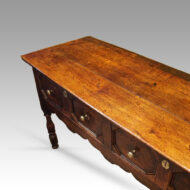 Antique oak long dresser base top detail