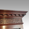 George III mahogany breakfront bookcase cornice
