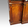 George III mahogany breakfront bookcase cupboard end door