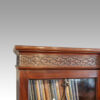 George III mahogany breakfront bookcase end fret