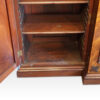 George III mahogany breakfront bookcase end interior