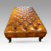 Large deep buttoned leather stool end