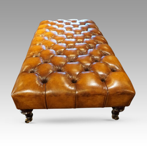 Large deep buttoned leather stool end