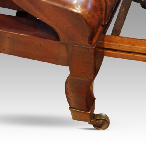 Antique reclining library chair front leg