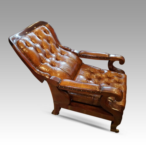 Antique reclining library chair stool left in