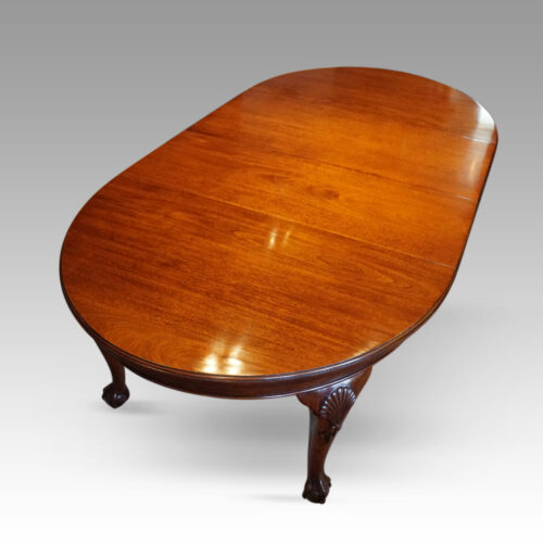 Edwardian mahogany extending dining table end view