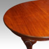 Edwardian mahogany extending dining table round end