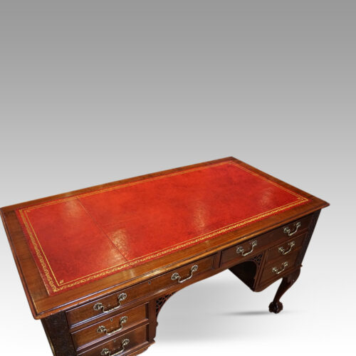 Edwardian Chippendale mahogany desk leather top