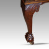 Edwardian Chippendale mahogany desk leg detail